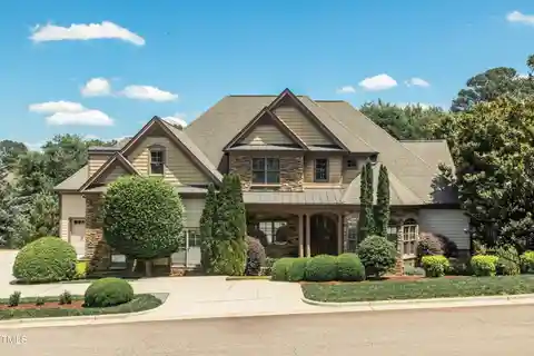 Custom Home with a Private Wooded Yard in Desirable Dunleith