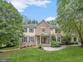 Custom Masterpiece Surrounded by Mature Trees