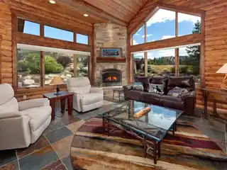 Immaculate Home with Rustic Log Accents
