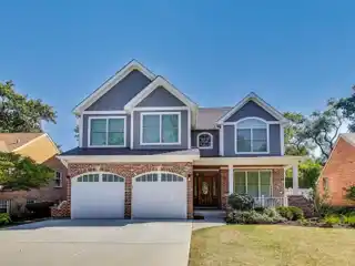 Four-Level Elegance with Designer Finishes Throughout