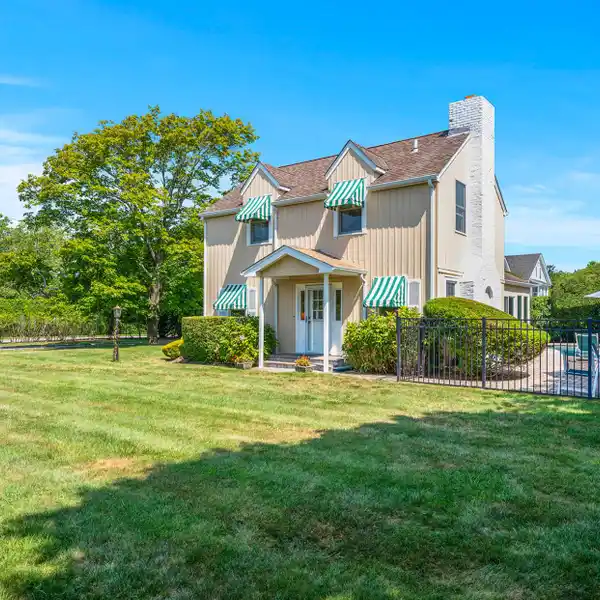 SERENE QUOGUE ESTATE WITH GATED ENTRANCE AND POOL