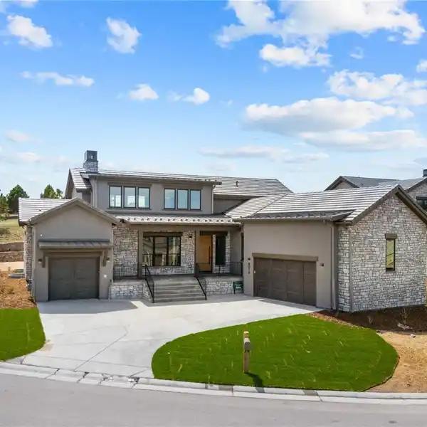 BEAUTIFULLY APPOINTED NEW CONSTRUCTION ON A CORNER LOT