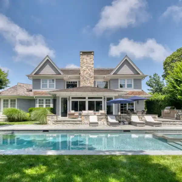 CUSTOM-BUILT HAMPTONS GEM STEPS FROM ROGERS BEACH