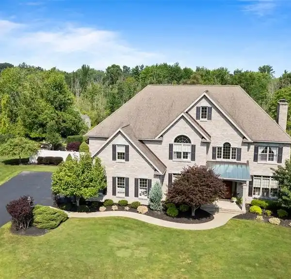 CUSTOM BEAUTY ON NINE-PLUS ACRES