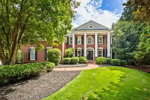 Exquisite White Columns Home in a Premier Community