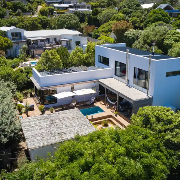 CONTEMPORARY COASTAL RETREAT WITH BREATHTAKING VIEWS IN SOUGH AFTER BEACH AREA