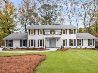 Stately Brick Residence with Impeccable Designer Updates