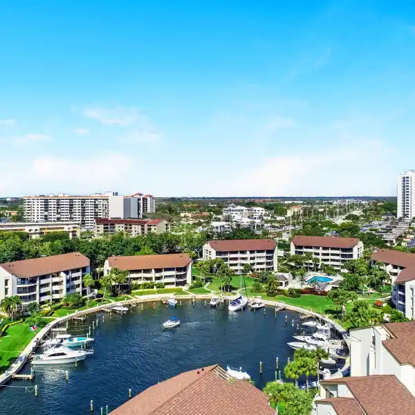 STUNNING END UNIT WITH BOAT SLIP IN PRIVATE MARINA