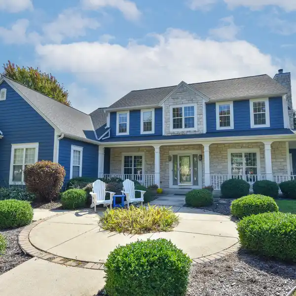 CHARMING FAMILY HOME FEATURING BRIGHT EAT-IN KITCHEN