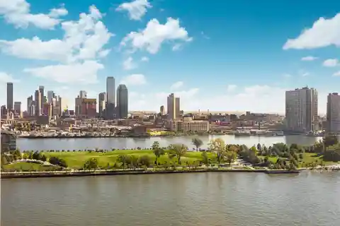 Exquisite Riverfront Apartment with Skyline Views