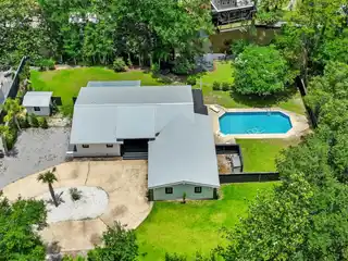 Extraordinary Canal-Front Sanctuary Set on a Rare Double Lot