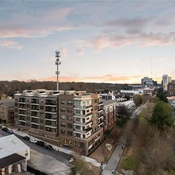 MIDRISE PENTHOUSE CONDO IN A COVETED NEIGHBORHOOD