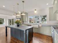STUNNING AND COMFORTABLE MODERN HOME IN COVETED NEIGHBORHOOD