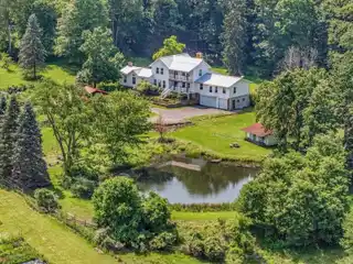 Redesigned Farmhouse Retreat on 20 Scenic Acres