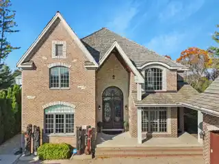 Grand Lakefront Estate with Exceptional Amenities