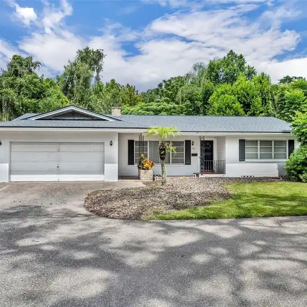 EXPANSIVE LOT WITH GREAT POTENTIAL