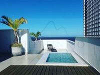 SPACIOUS PENTHOUSE TRIPLEX JUST STEPS TO THE BEACH