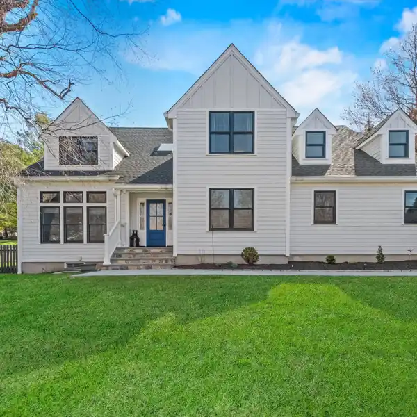 IMPECCABLY MAINTAINED AND TASTEFULLY UPDATED HOME