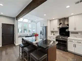 Extensively Renovated Townhome Blocks from the Sand