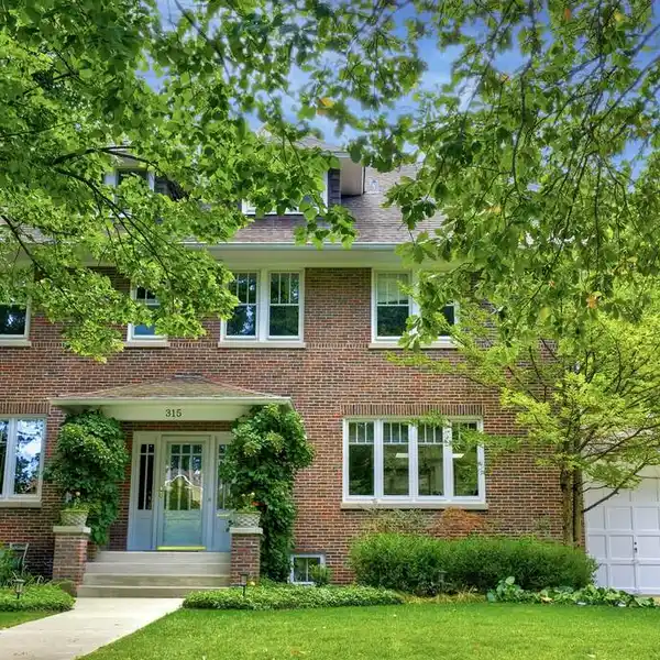CLASSIC RED BRICK COLONIAL IN A PRIME LOCATION