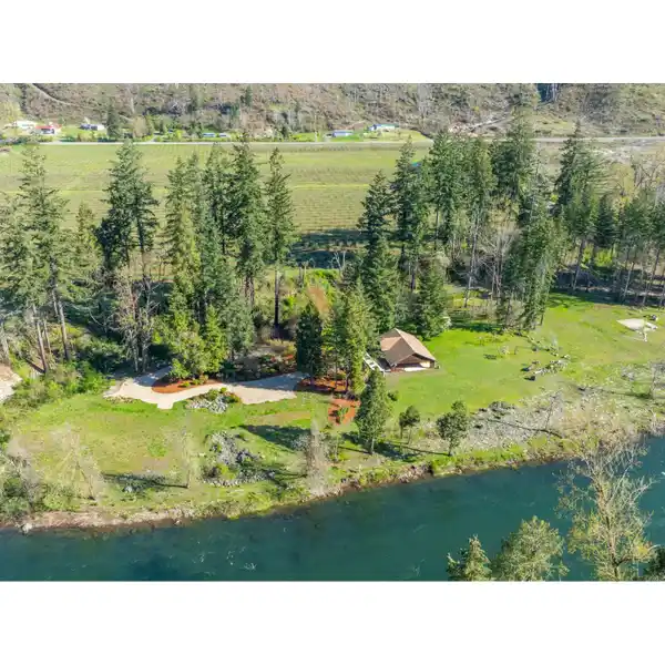 BUILD YOUR DREAM ON FIVE RIVERFRONT ACRES