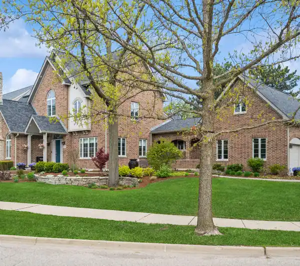 EXCEPTIONAL BRICK HOME ON A CORNER LOT