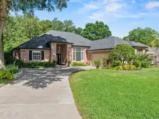 Elegant Brick Home with Tranquil Water Views