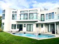 STUNNING CONTEMPORARY SUMMER HOME WITH LUXURY AMENITIES