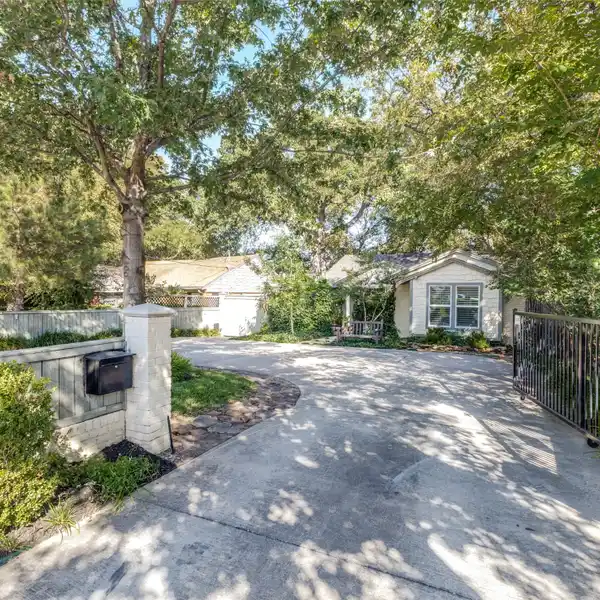 GATED RESIDENCE WITH GOURMET CHEF’S KITCHEN