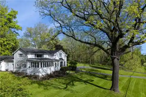 Charming Farmhouse on Expansive Private Lakefront