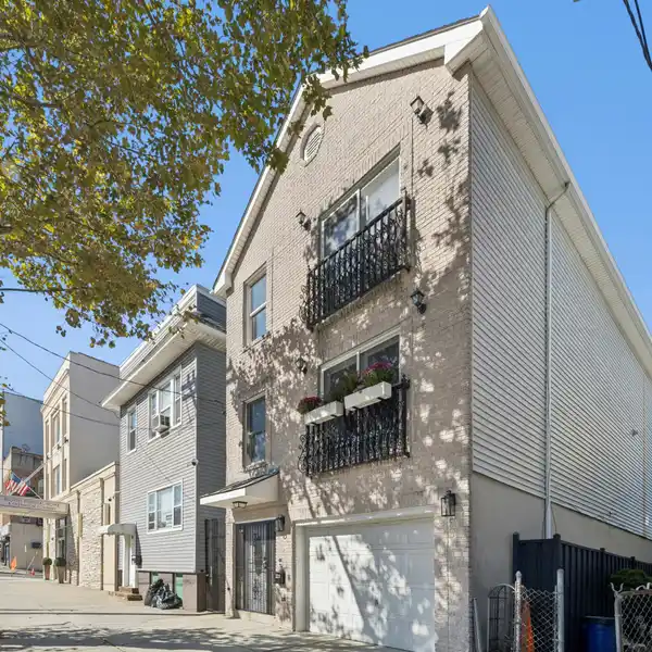LOVINGLY MAINTAINED TWO-FAMILY TOWNHOUSE IN THE HEART OF JERSEY CITY HEIGHTS