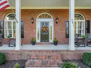 Elegant Waterfront Living Brick Ranch