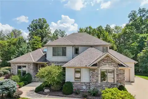 Low-Maintenance Luxury with Expansive Wooded Views