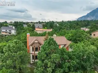 Broadmoor Bluffs Home with Mountain and City Views