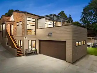 Elevated Family Retreat with Expansive Sunlit Decks