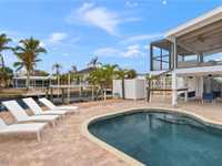 GORGEOUS COMPLETELY REMODELED CANAL HOME