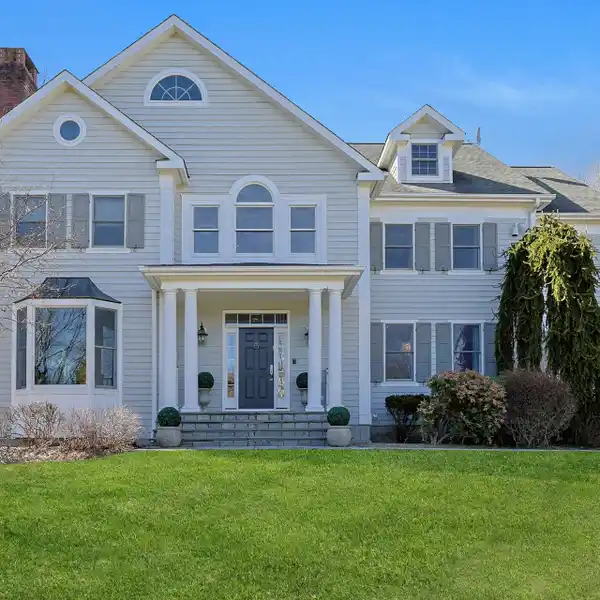 AMAZING CENTER HALL COLONIAL ON OVER TWO ACRES