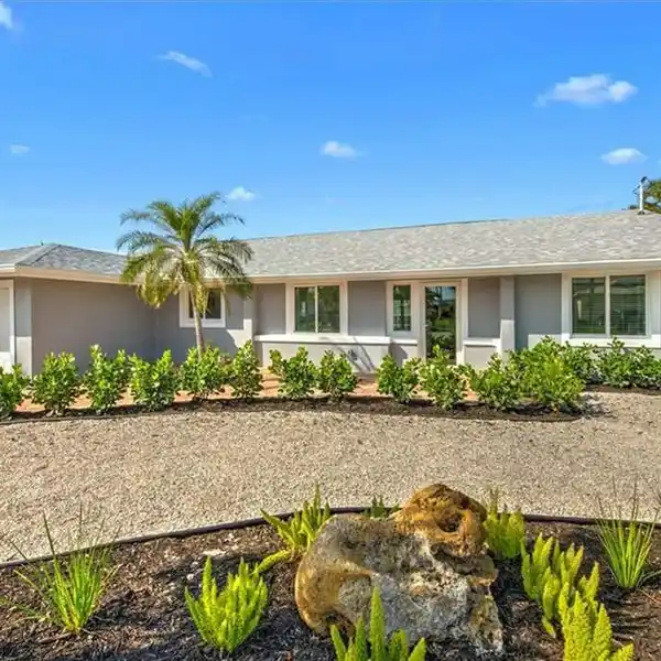 METICULOUSLY REBUILT GULF-ACCESS POOL HOME