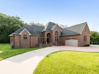 Artfully Crafted Estate in Prestigious Upper Glade