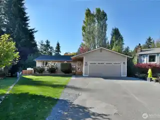 4-Bedroom Home with Bonus Room, Deck & Spacious Yard