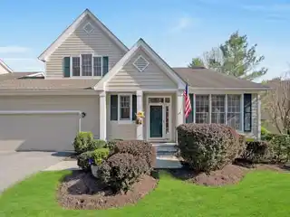 Beautifully Maintained End Unit in the Riverwoods Community