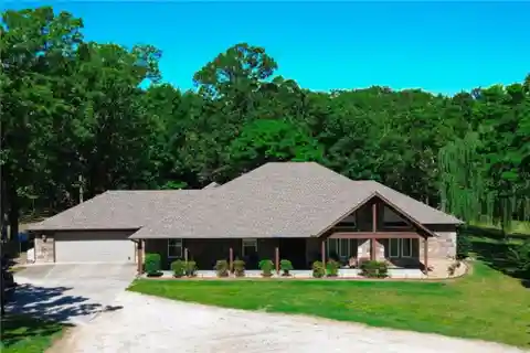 Secluded Acreage Retreat with Massive Workshop