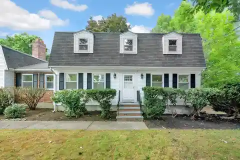 Wonderfully Upgraded Colonial in Ideal Location
