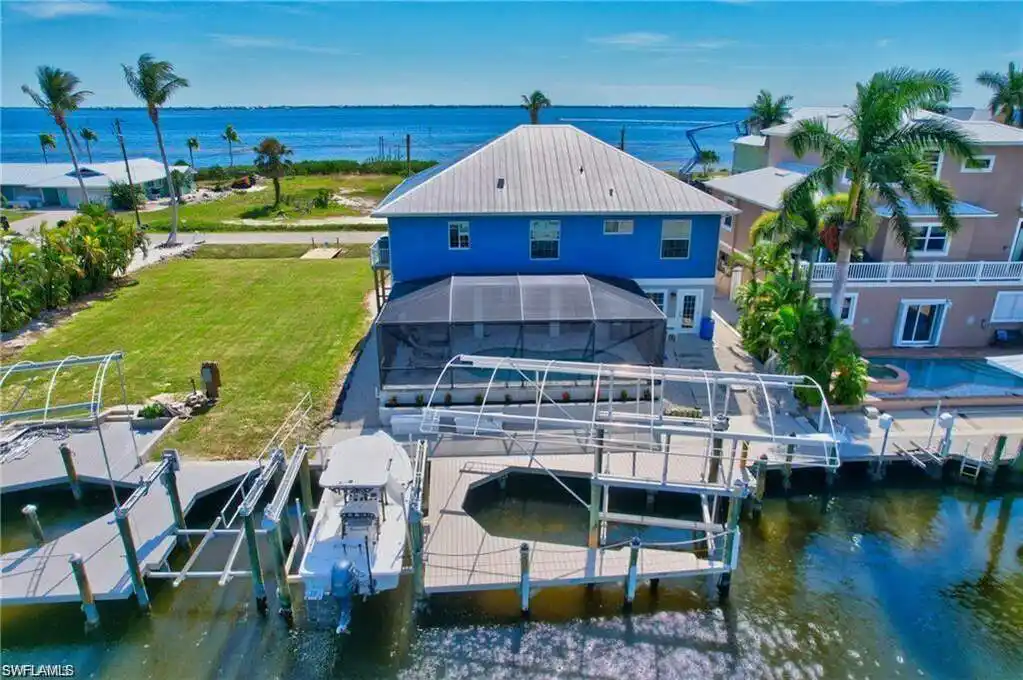 Remarkable Waterfront Gulf Access Pool Home