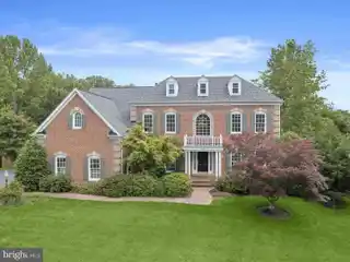 Exceptional Brick-Front Colonial Home