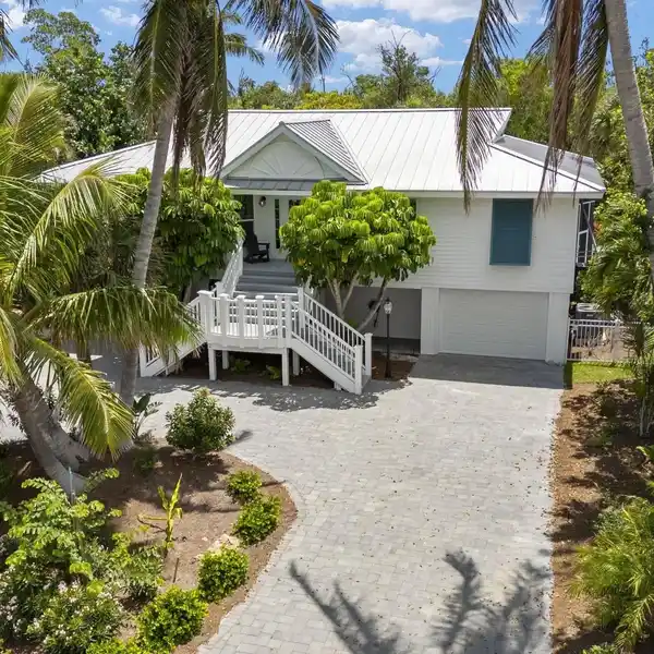 METICULOUSLY MAINTAINED CANAL-FRONT HOME