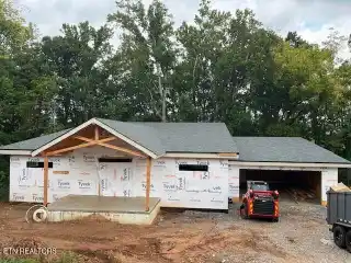 Energy-Efficient Home Backing to Natural Spring