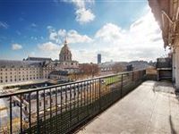 SIXTH FLOOR APARTMENT WITH SUPERB VIEW OF THE INVALIDES DOME