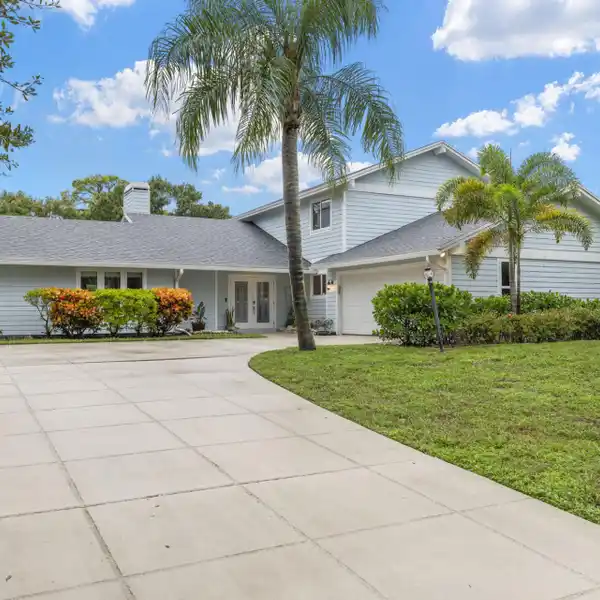 HALF-ACRE LOT WITH GRANITE, BUTCHER BLOCK ISLAND & CUSTOM CABINETS