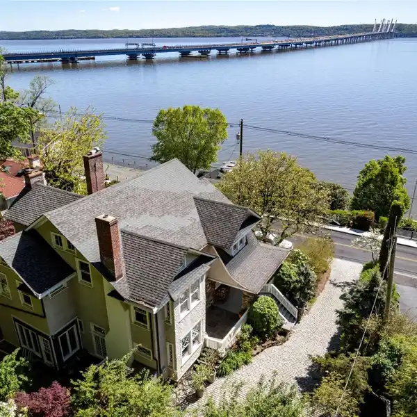 TIMELESS ELEGANCE WITH MODERN CONVENIENCE AND SWEEPING RIVER VIEWS